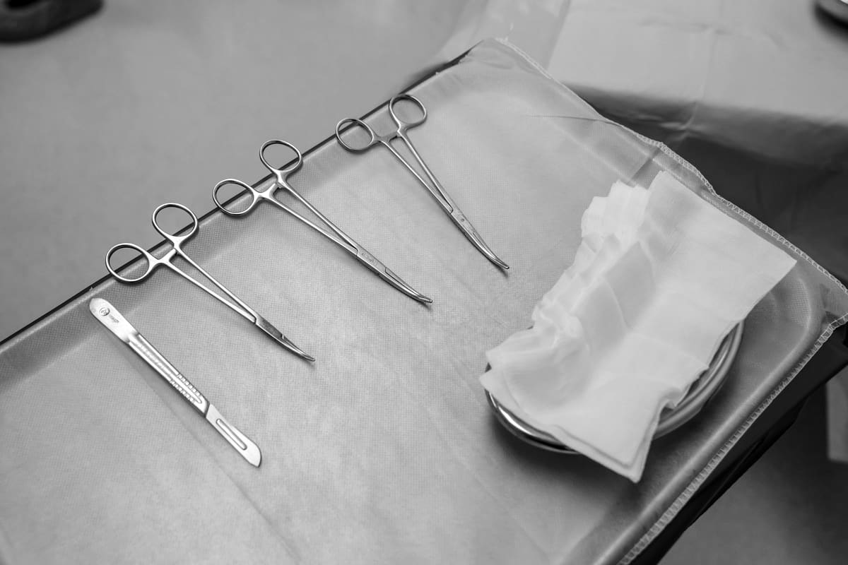 A sterile surgical instrument tray